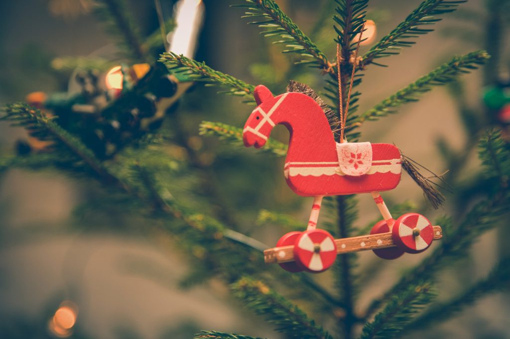 https://www.pexels.com/photo/brown-and-red-horse-decor-hanged-on-christmas-tree-212311/