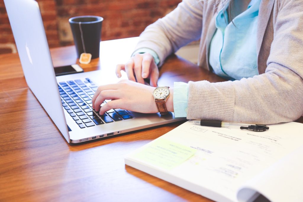 https://www.pexels.com/photo/book-macbook-pro-working-studying-7354/